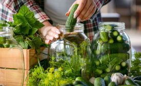 woman canning vegetables