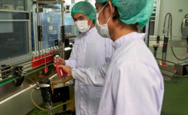 workers at food processing plant