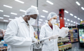 two inspectors in grocery store