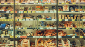 cooler at a retail store full of assorted packaged meats