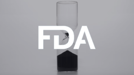 hourglass with an fda logo overlay